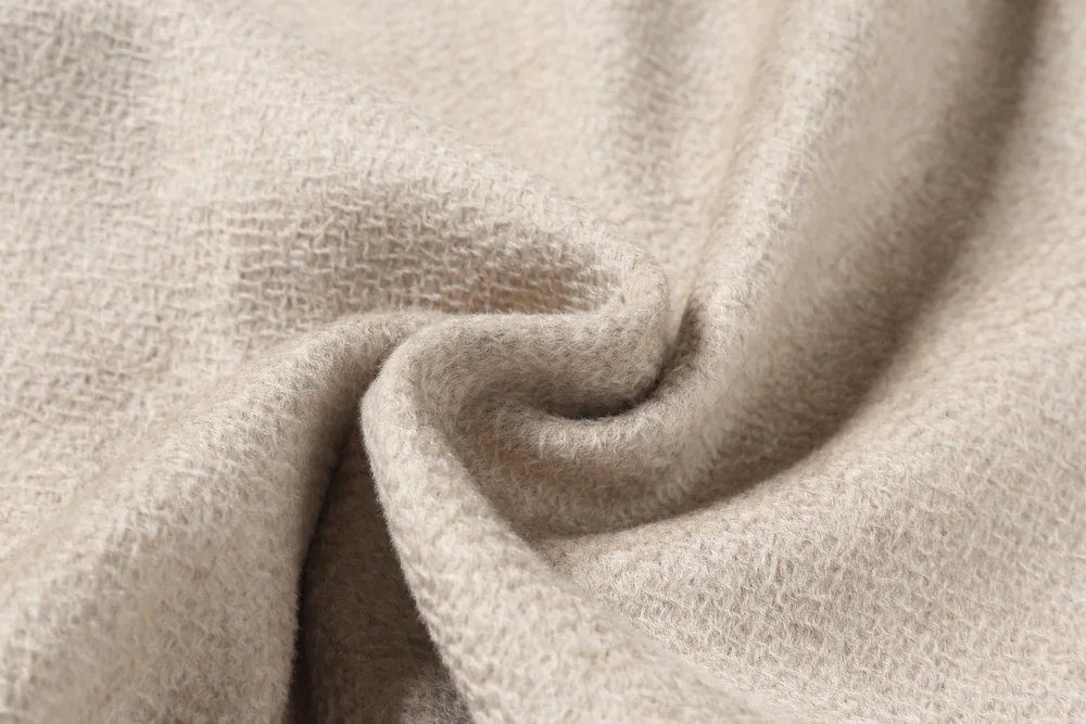 Oatmeal fabric photographed for TINGSU, showing the brushed ripple surface